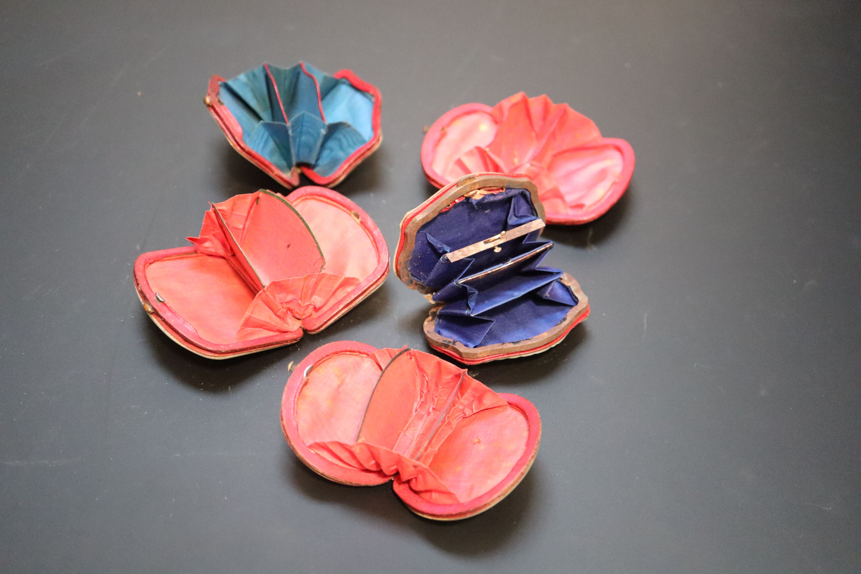 Five assorted 19th century Palais Royale mother of pearl mounted purses,